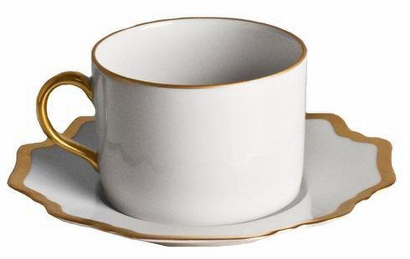 Antique White Teacup and Saucer